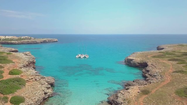 Tropical Ionian Greece Blue Lagoon island Aerial 4k travel video. Ocean sea forest coast seashore, water, yacht boat
