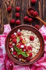 oatmeal porridge with raspberry and nut
