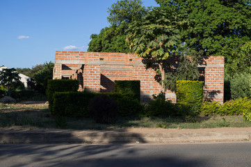 Fototapeta na wymiar Unfinished House in a Residential Street, Livingstone, Zambia