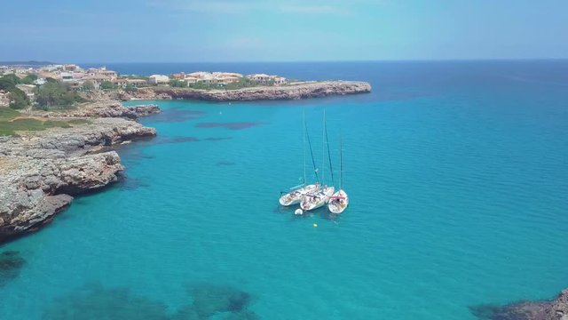 Tropical Ionian Greece Blue Lagoon island Aerial 4k travel video. Ocean sea forest coast seashore, water, yacht boat