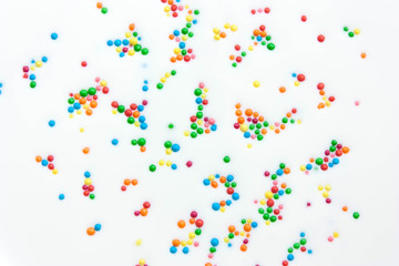 Abstract background from milk with colored balls