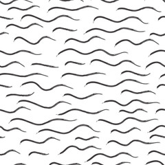 Fototapeta premium Abstract seamless black and white pattern of hand drawn doodle wavy lines. Scandinavian design style. Vector illustration for textile, backgrounds etc