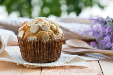 Homemade bakery banana muffin on wood table.