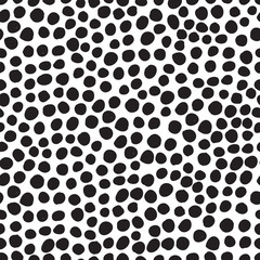 Abstract seamless black and white pattern of hand drawn doodle dots elements. Scandinavian design style. Vector illustration for textile, backgrounds etc