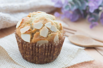Homemade bakery banana muffin on wood table.