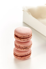 tower of three strawberry flavored macaroons
