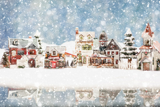 Snowy North Pole Santa's Village with reflection photo to make a festive Christmas holiday card or for a background