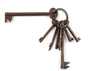 A bunch of old keys on a keyring