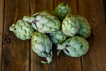 artichokes on wooden table