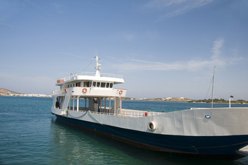 Fototapeta na wymiar car and passenger ferry boat goes from Paros to Anti-Paros Cyclades Greek Islands in Greece