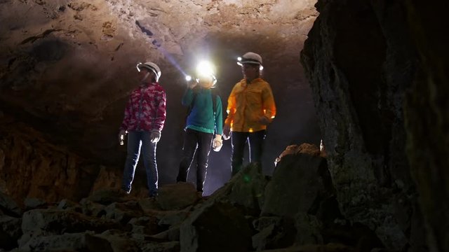 Children consider the room in the cave