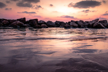 Fototapeta na wymiar Beautiful colors sunset with rocks 