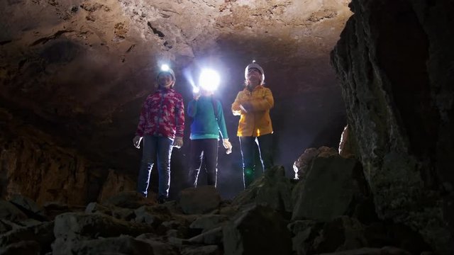 Children visiting the minerals in the cave