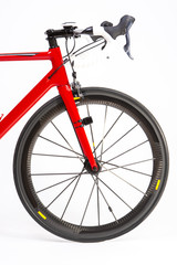 Cycling Sport Concepts. Closeup of Professional Road Bike with Deep Carbon Rims Wheelset.