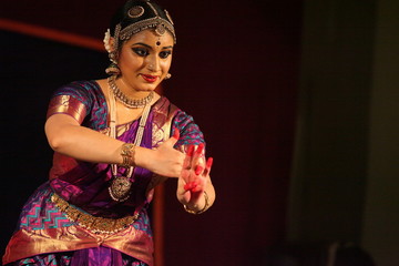 bharatha natyam,one of the eight classical dance forms of india.here the dancer during a stage performance