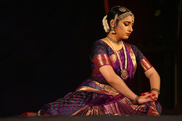 bharatha natyam,one of the eight classical dance forms of india.here the dancer during a stage performance
