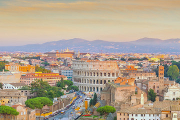 Fototapeta premium Top view of Rome city skyline with Colosseum and Roman Forum