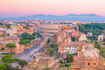 Fototapeta premium Top view of Rome city skyline with Colosseum and Roman Forum