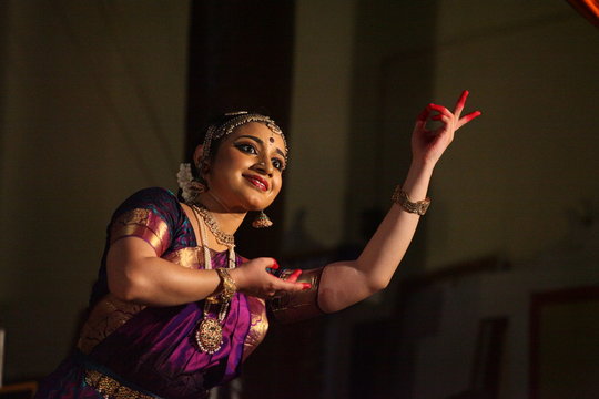 bharatha natyam,one of the eight classical dance forms of india.here the dancer during a stage performance