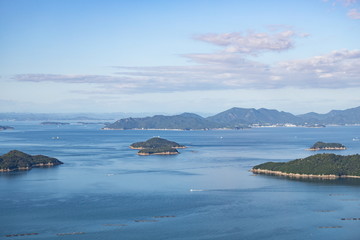 Landscape of islands and ships on the seto inland sea,Takamatsu,Kagawa,sikoku,japan - obrazy, fototapety, plakaty