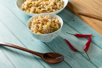Egg Fried rice with a blue wood grain background