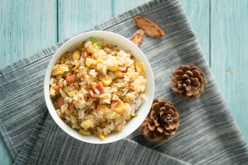 Egg Fried rice with a blue wood grain background