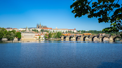 Naklejka premium Vltava River with view of Prague skyline in Czech Republic