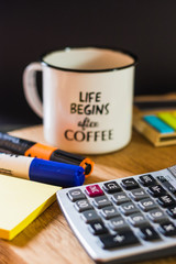 Accounting supplies on a wooden background