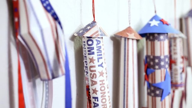 Paper firecrackers made from red, white and blue paper for July 4th celebration