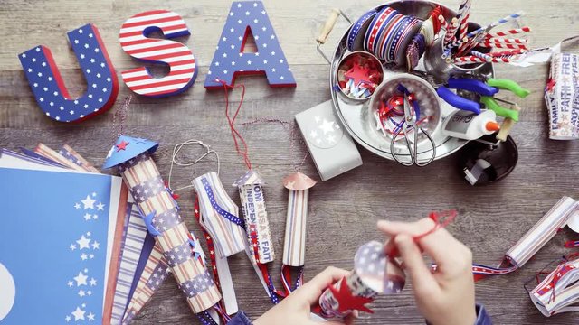 Paper firecrackers made from red, white and blue paper for July 4th celebration