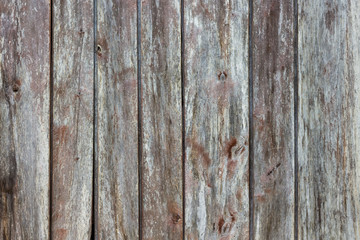 Texture from old cracked boards with traces of curtain paint_