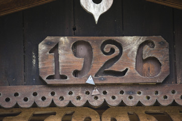 The figures cut out on the tree are Nineteen hundred and twenty-six.
Old house in Poland, in the Podlasie region