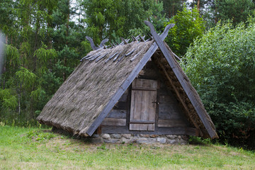 Fototapeta na wymiar A house near a mixed forest in Poland in Podlasie region. Fairy house