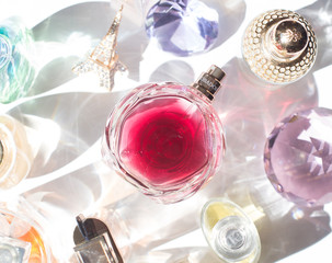 Togliatty Russia Circa June 2018- few perfume bottles flat lay image at white background, woman...