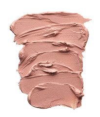 Light beige makeup smear of creamy foundation