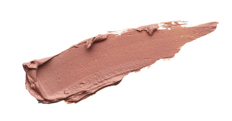 Light beige makeup smear of creamy foundation