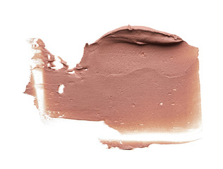 Light beige makeup smear of creamy foundation