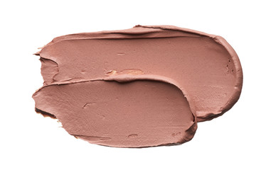 Light beige makeup smear of creamy foundation