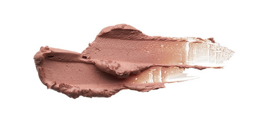 Light beige makeup smear of creamy foundation