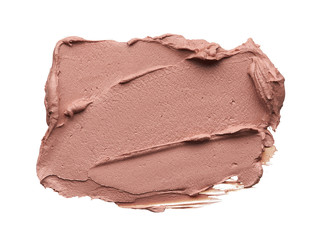 Light beige makeup smear of creamy foundation