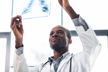 Close up of attentive man that checking result