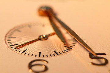 clock. arrows on the clock face