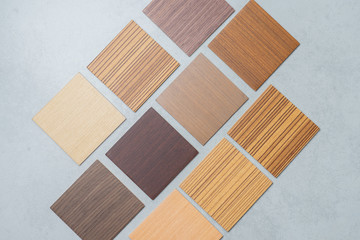 samples of material, wood , on concrete table.Interior design select material for idea.