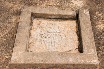 A pair of foot prints near Chavundaraya Basadi, Chandragiri hill temple complex, Sravanabelgola, Karnataka