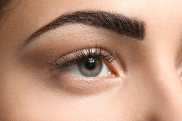 Young woman with permanent eyebrows makeup, closeup