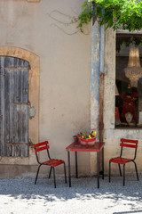Red chairs in Lourmarin, Provence, France