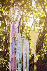 Dream catchers hanging on tree bush