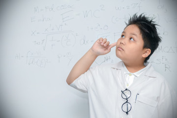 Scientist boy thinking on white background