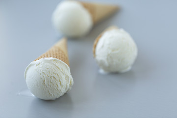Fototapeta na wymiar wafer cone with white ball ice cream 