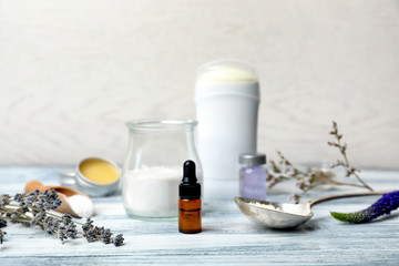 Natural ingredients for deodorant on wooden table